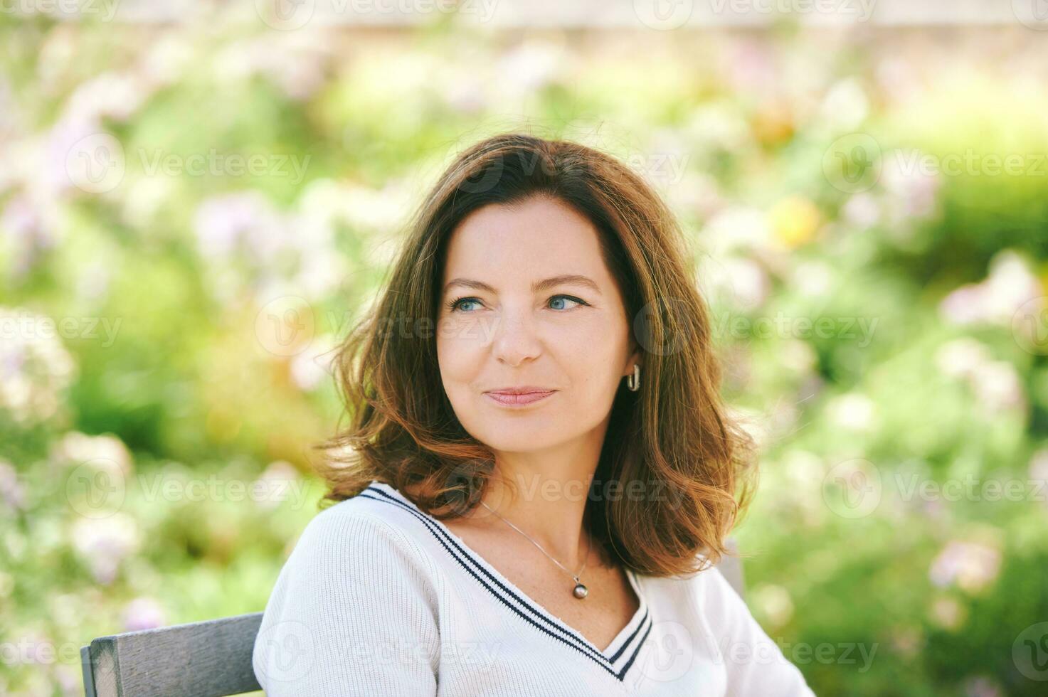 files/outdoor-portrait-of-beautiful-40-45-years-old-woman-sitting-on-bench-ib-green-park-healthy-lifestyle-photo.jpg